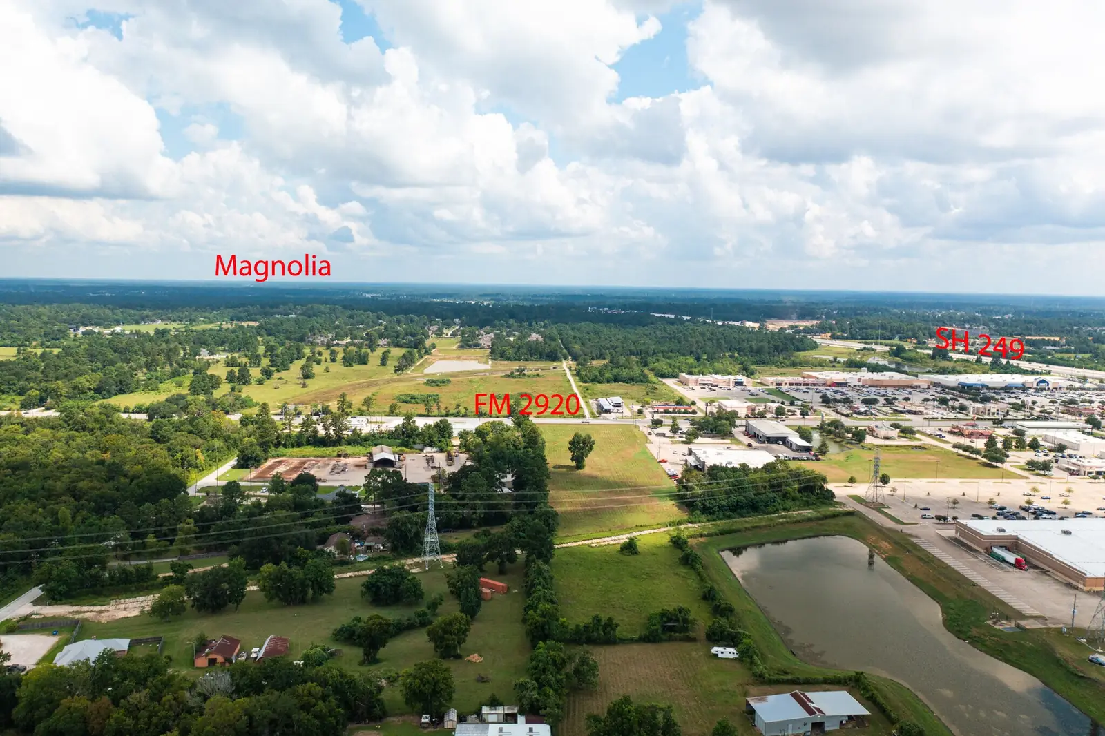 Aerial context view showing FM 2920, SH 249 and Magnolia to the northwest